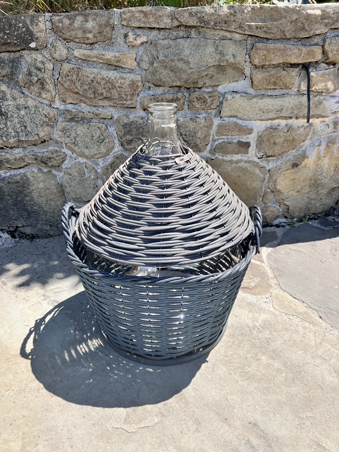 Mid -Century Large demijohn with basket