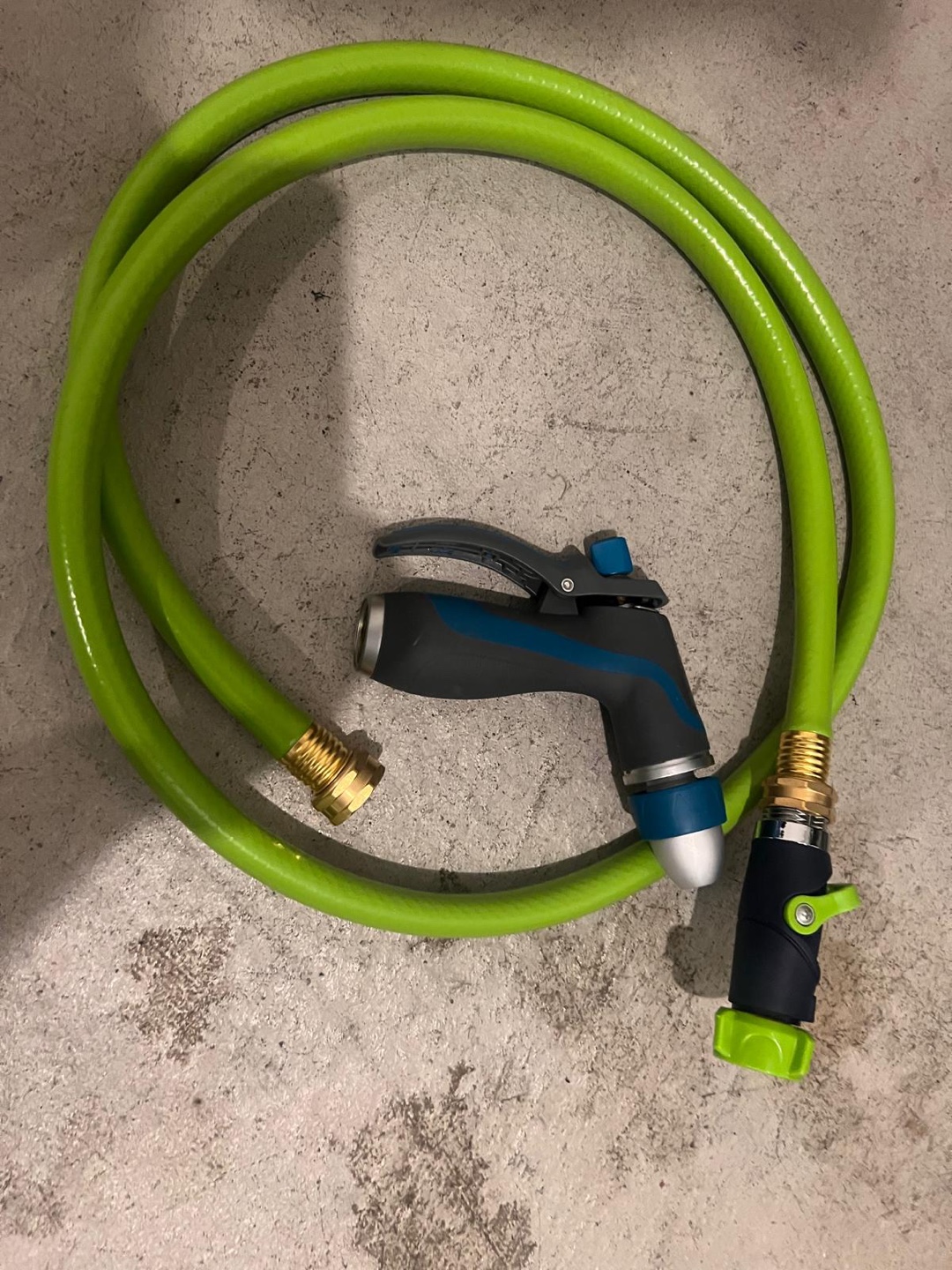 Green Garden Hose with Nozzle