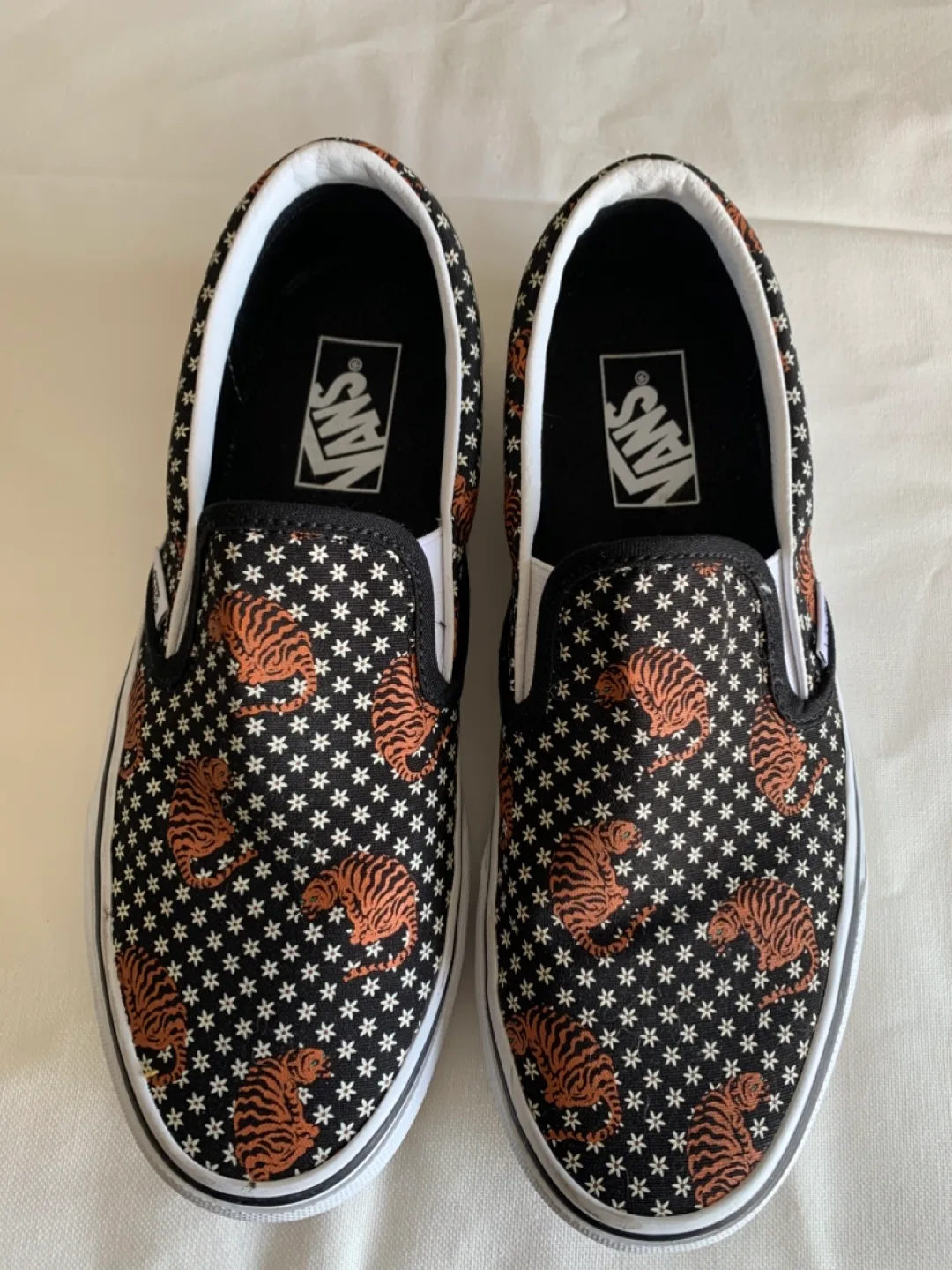 Vans Slip-On Sneakers - Black with Orange Tiger Pattern thumbnail