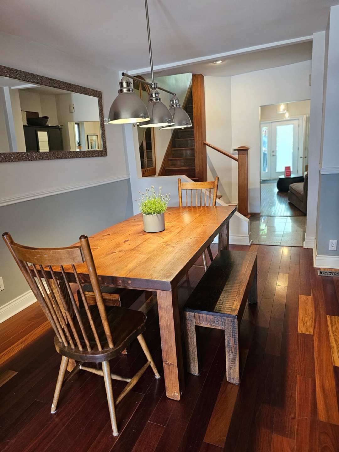 Rustic solid wood dining table, 2 benches and 2 chairs.