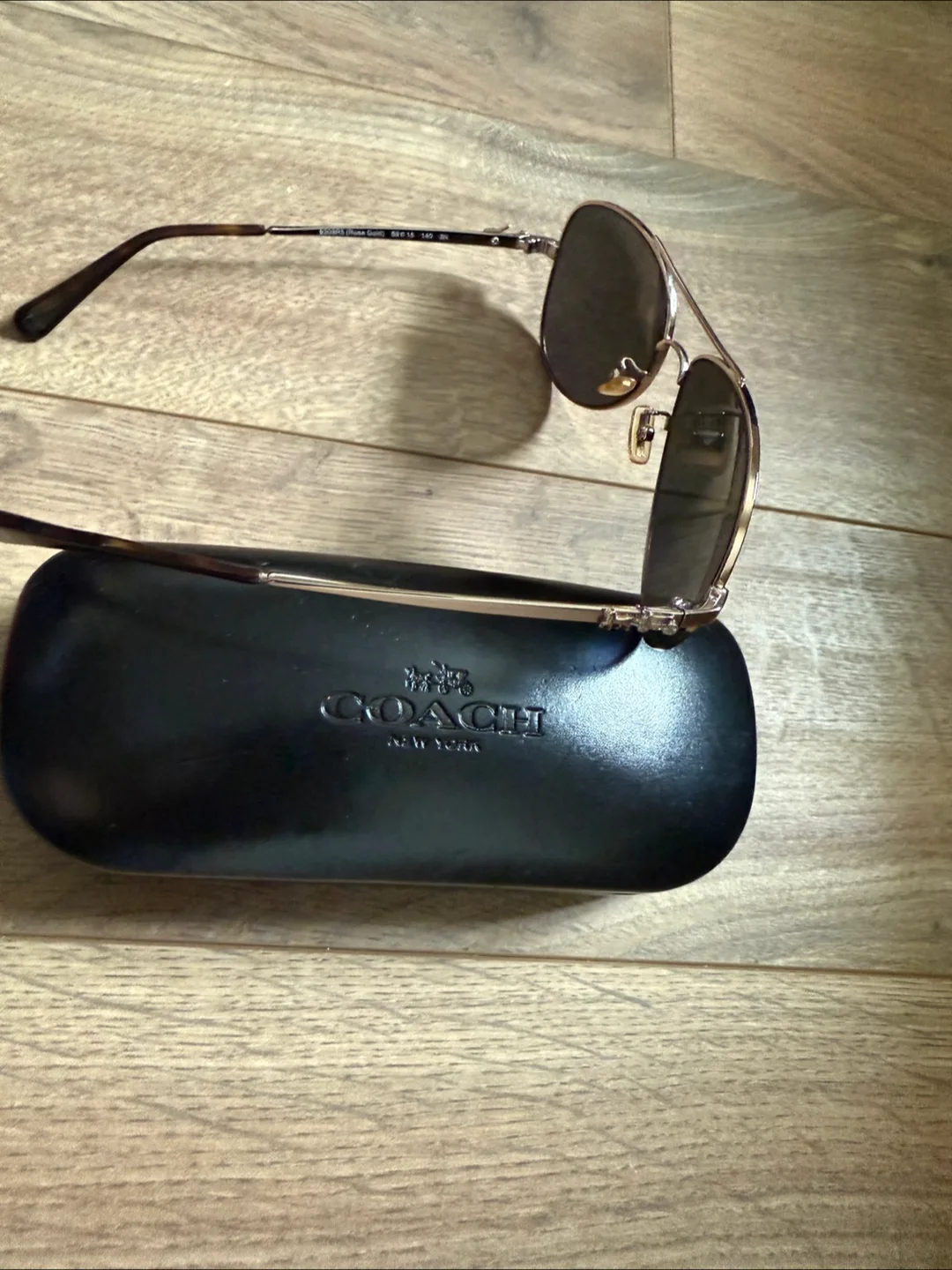 Coach sunglass image indicator(2)