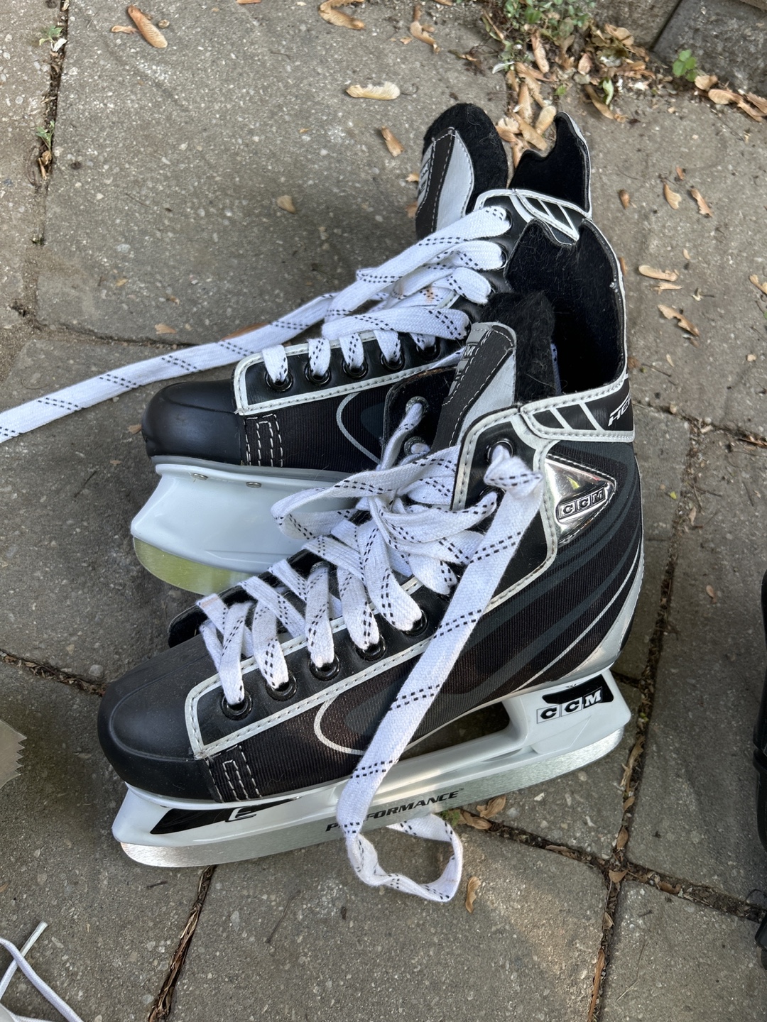 Assorted Figure Skates and Hockey Skates