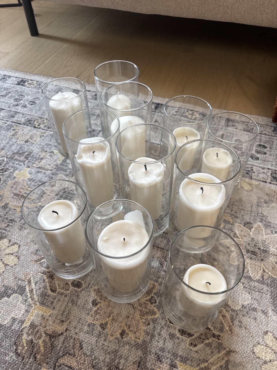Assorted long candles and holder