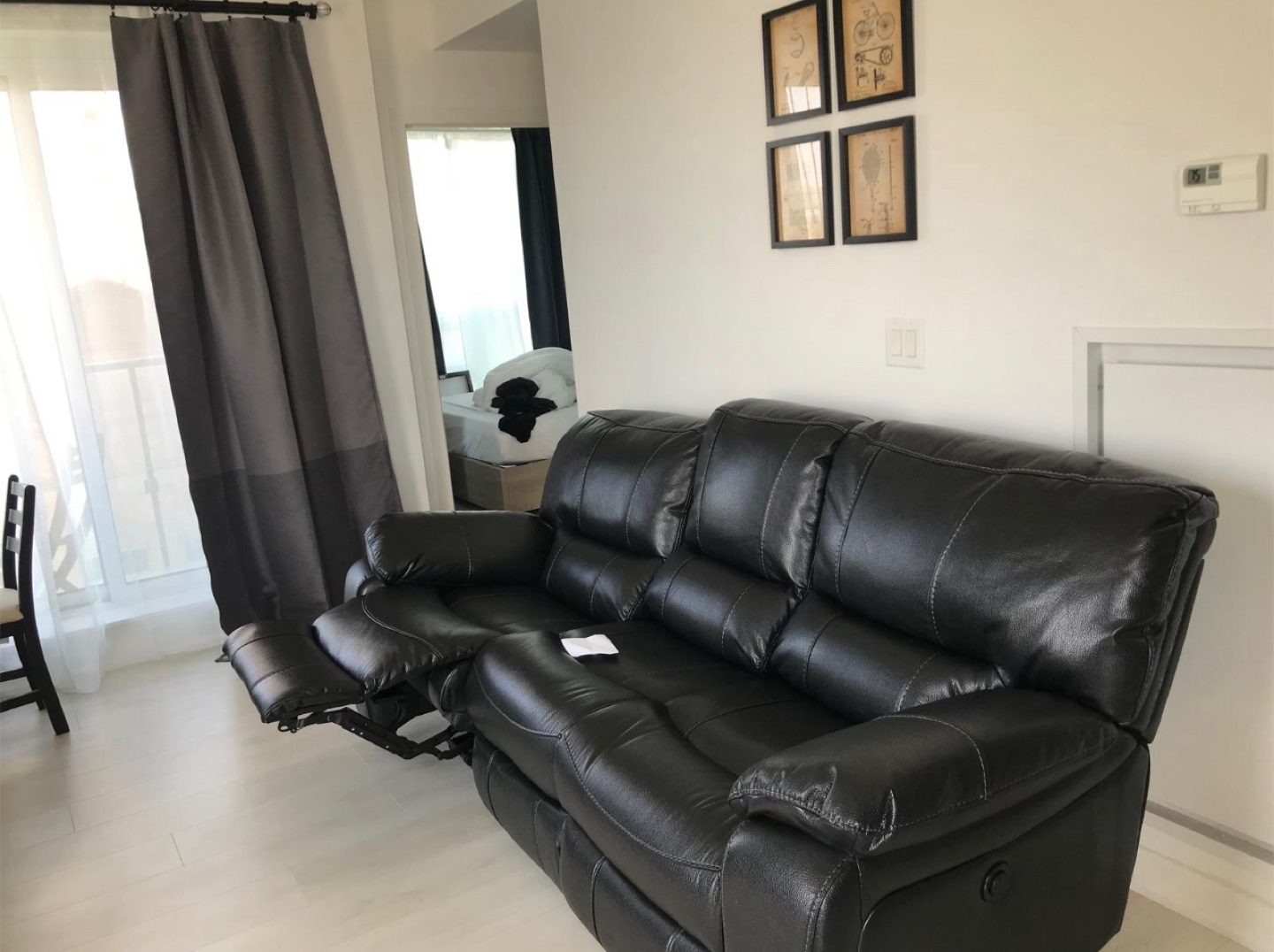 Black Leather Reclining Sofa
