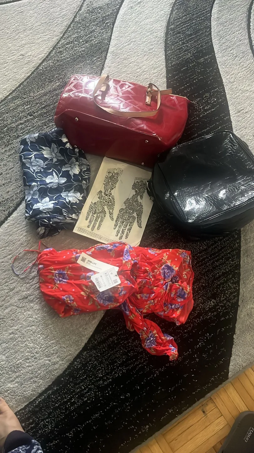 Bundle of items including bags and clothes thumbnail