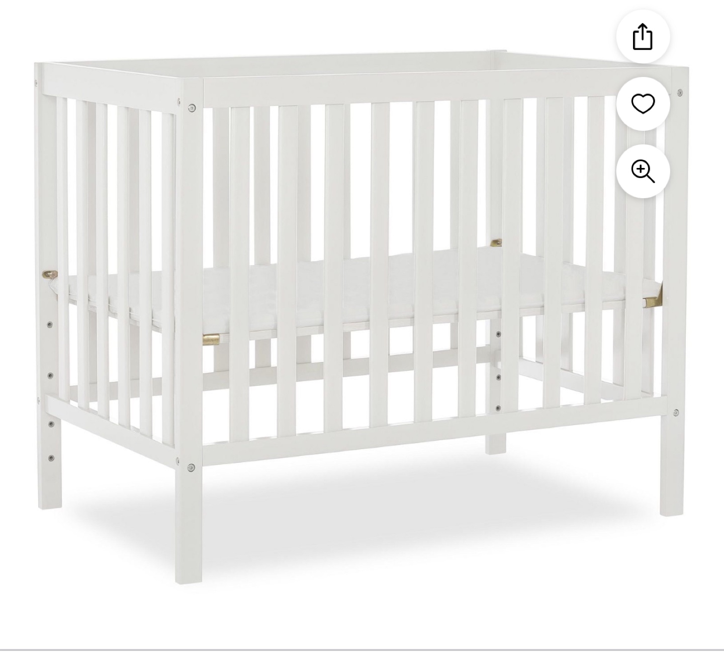 White wooden baby crib