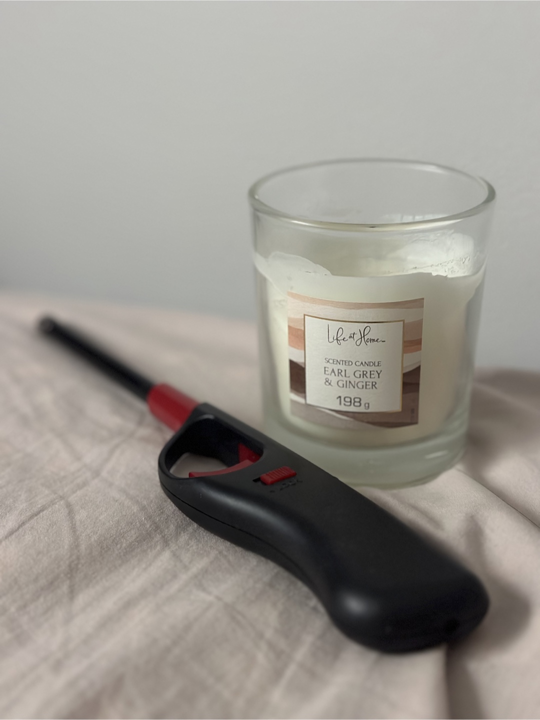 Scented candle and lighter