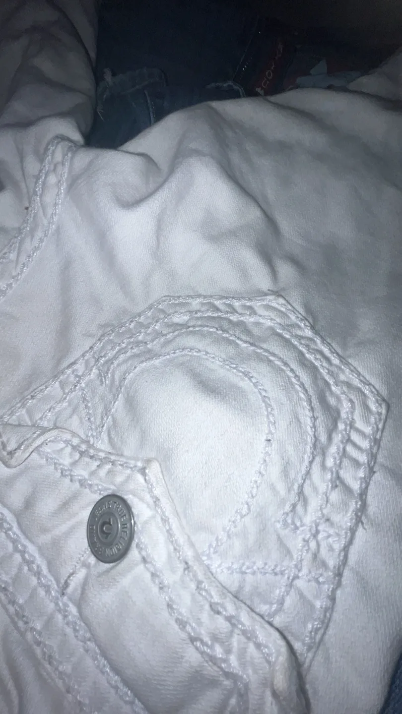 All white true religion jeans, DM for more pictures or offers image indicator(2)