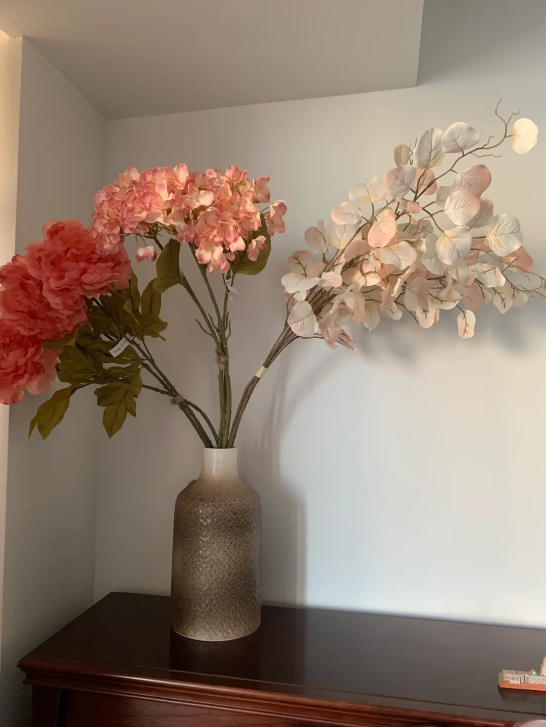 Floral arrangement in textured vase