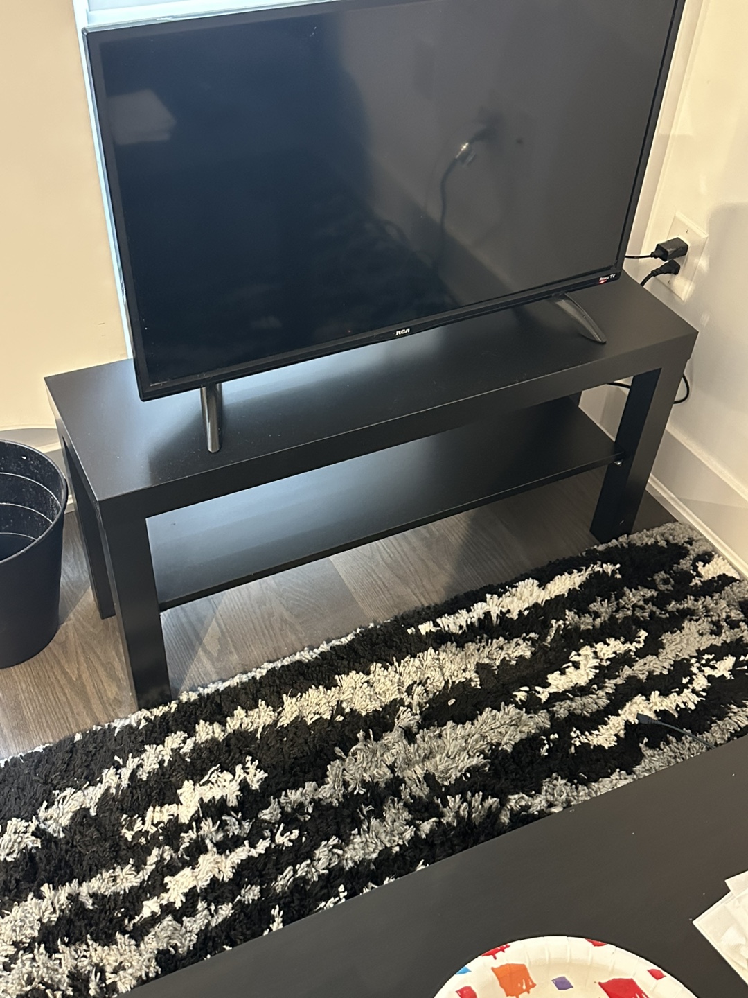 Black TV stand with shelf - photo 2