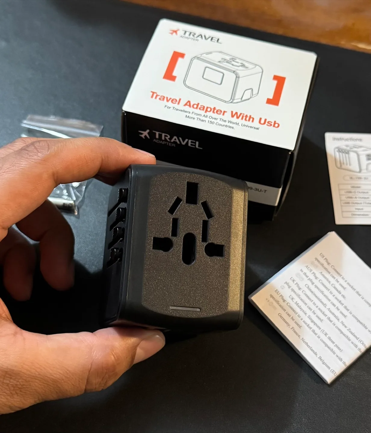 International Travel Adapter with USB Ports thumbnail