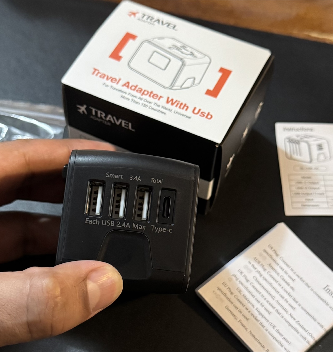 International Travel Adapter with USB Ports - photo 3