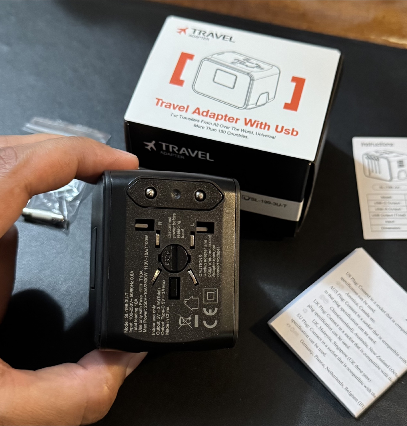 International Travel Adapter with USB Ports - photo 2