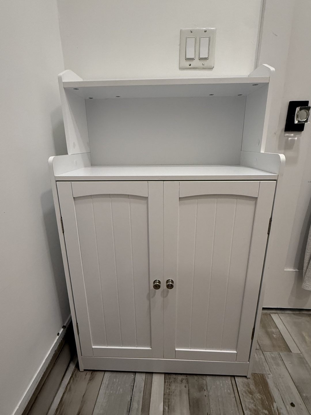 White bathroom storage cabinet