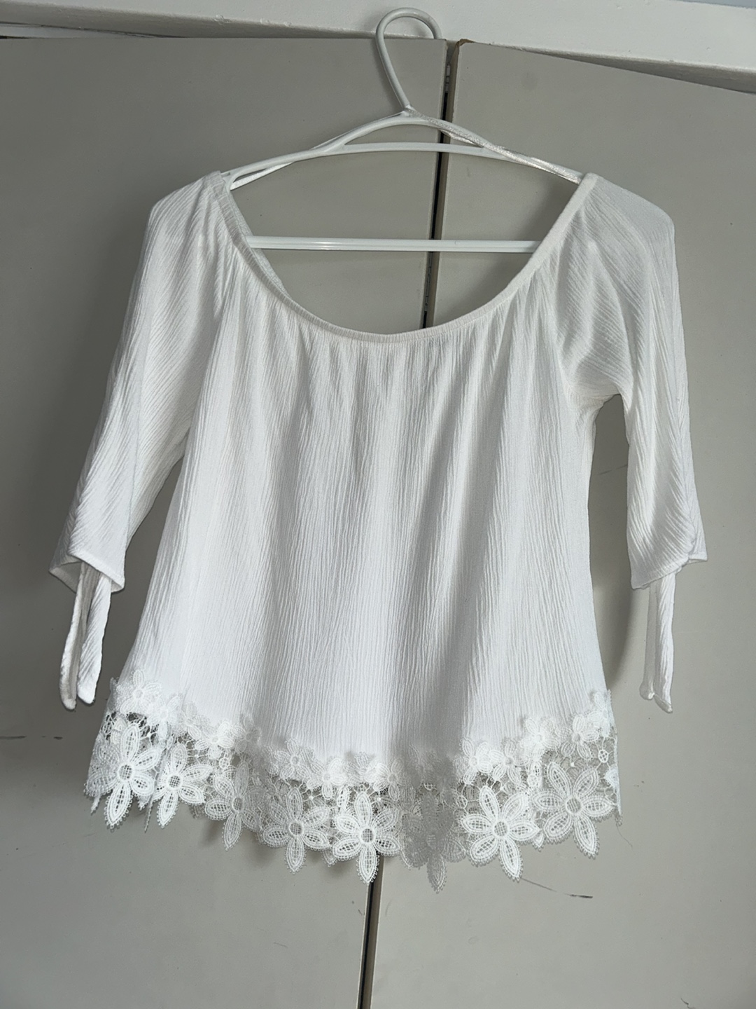 White off-the-shoulder blouse with lace detail