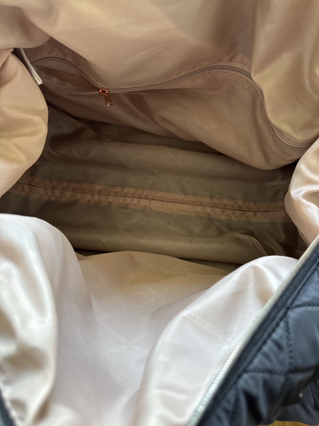 Cosmopolitan Quilted Rolling Duffel Bag - photo 4