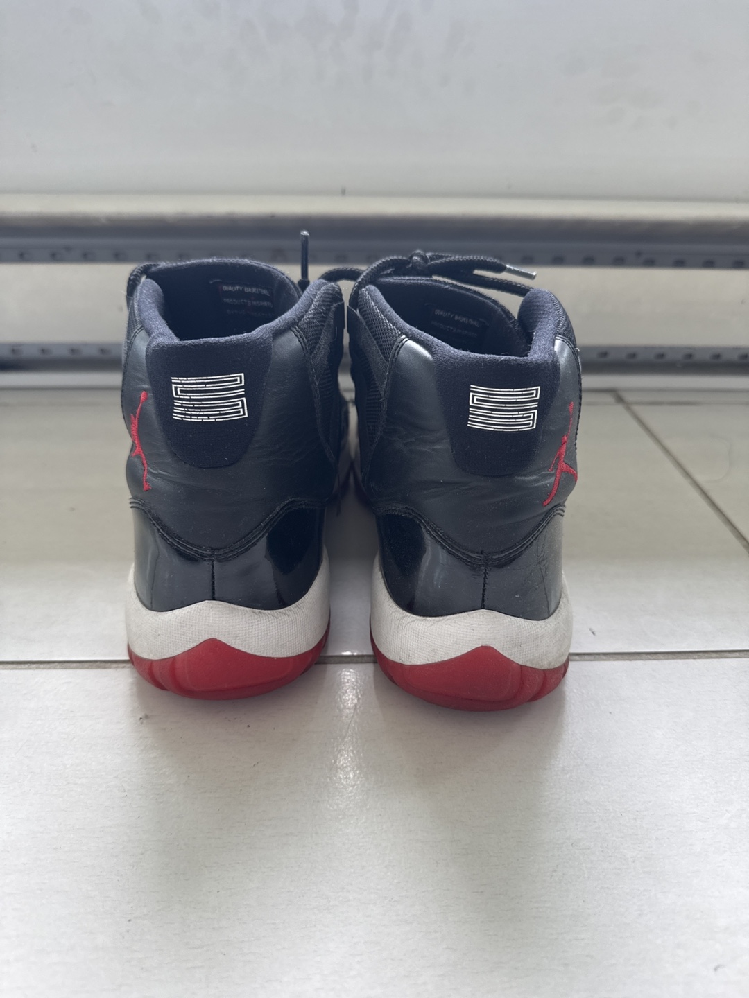 Nike Jordan 11 Retro Bred Sneakers - photo 3