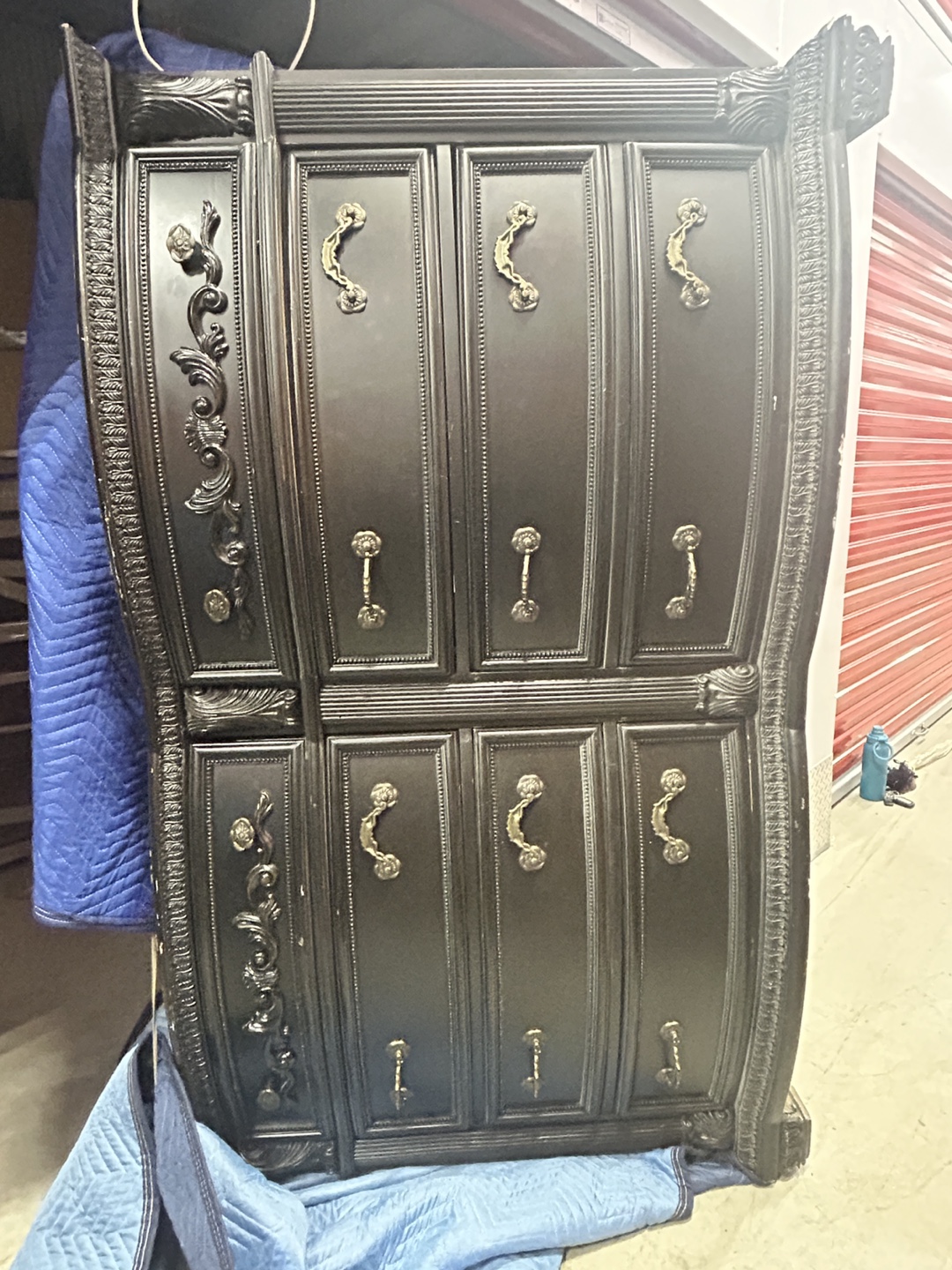 Large Black Dresser With Ornate Details