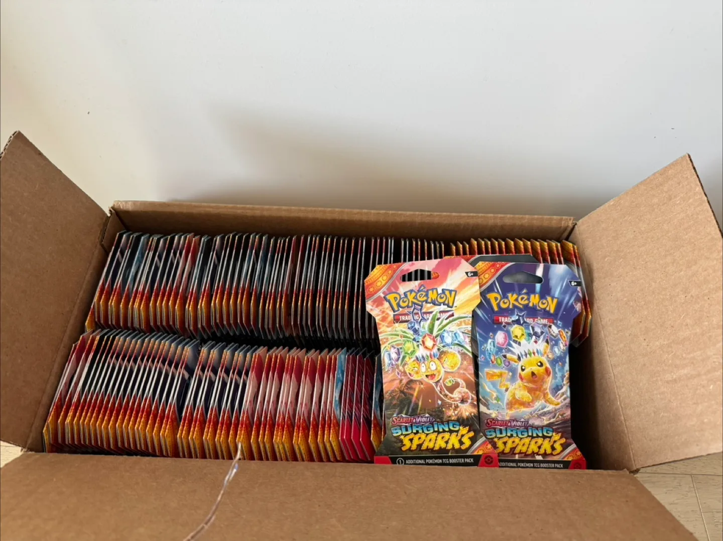 Pokemon surging sparks sleeved Booster packs thumbnail