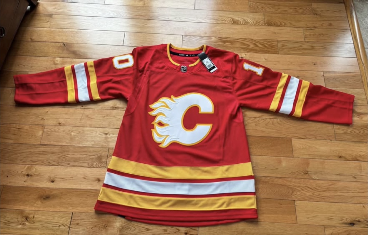 Jonathan Huberdeau Autographed Flames Jersey-size 52-Brand New