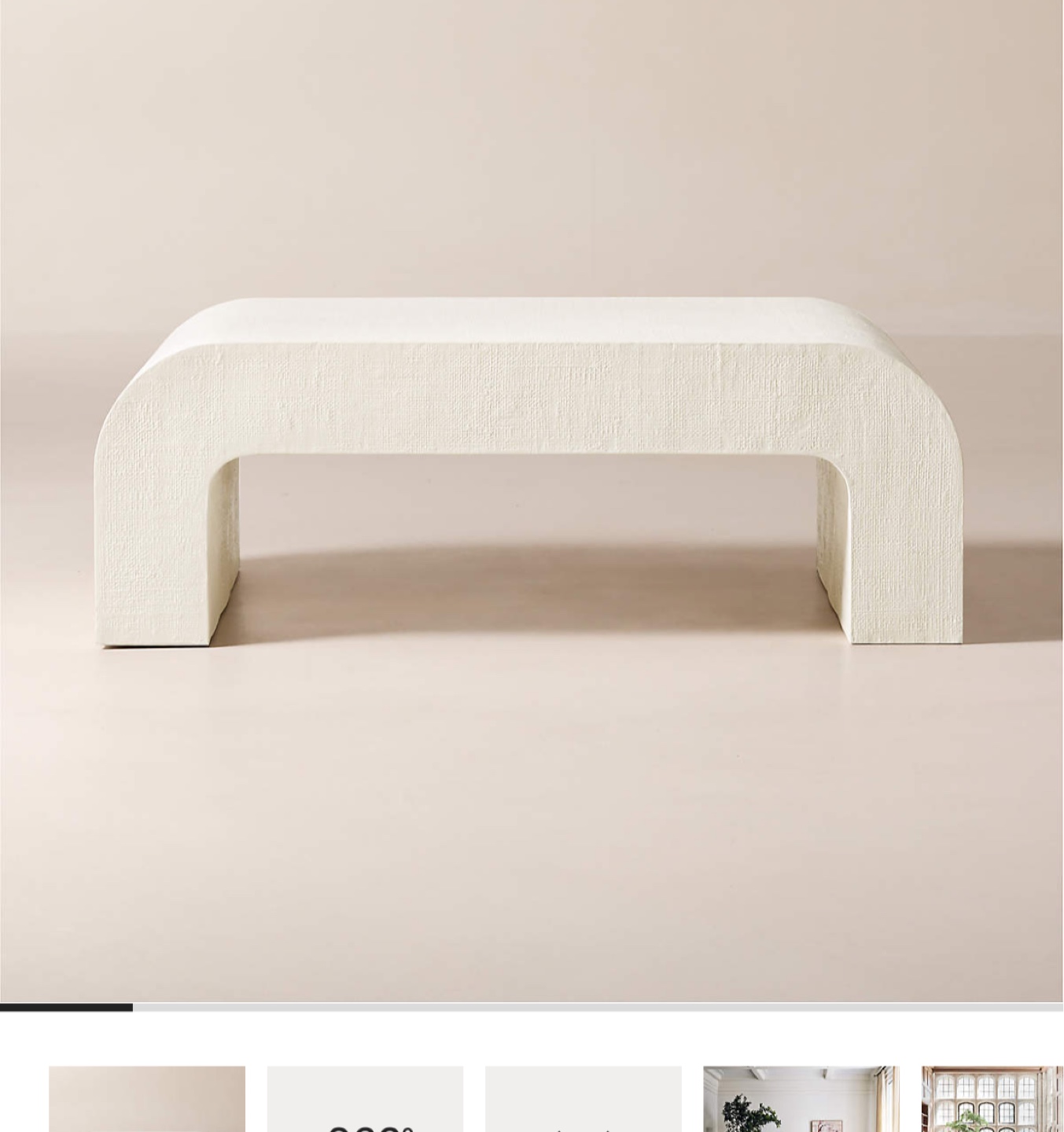 CB2 crescent coffee table in ivory