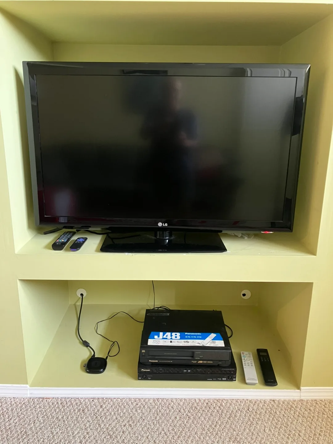 42” flat TV, Roku device and DVD player thumbnail