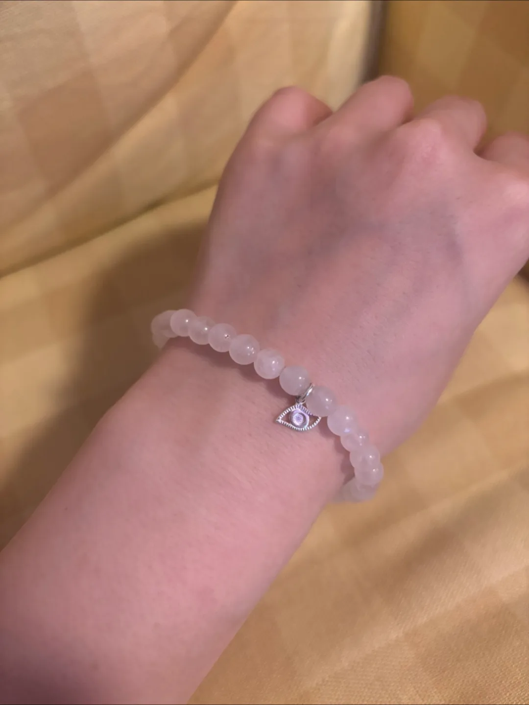 Beaded bracelet with charm thumbnail