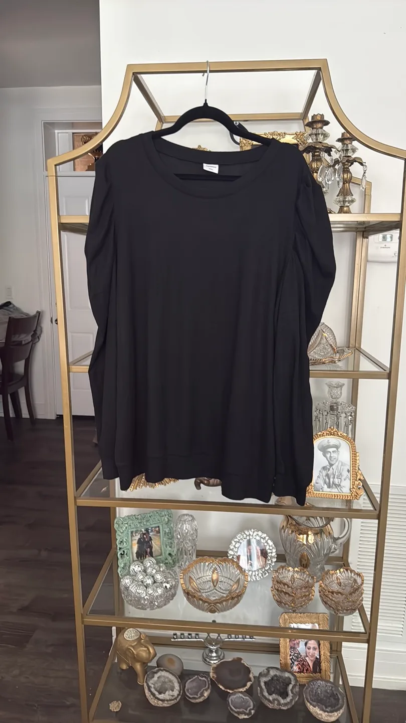 Black women’s top with ruffled shoulder thumbnail