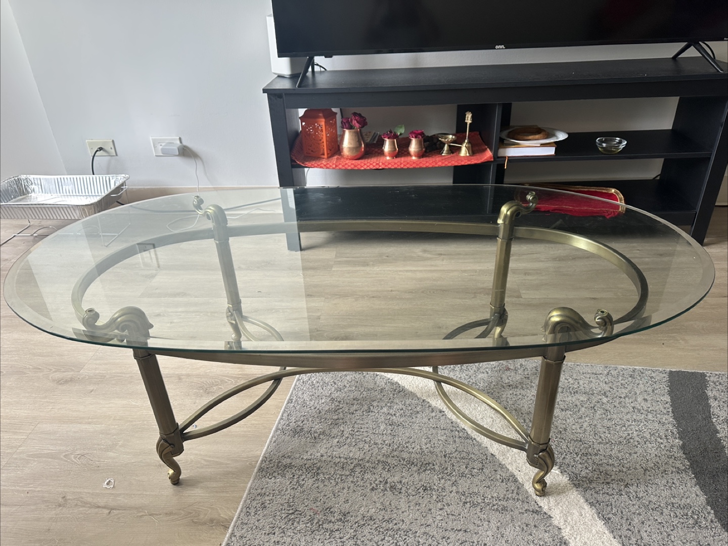 Glass Oval Coffee Table with Metal Frame