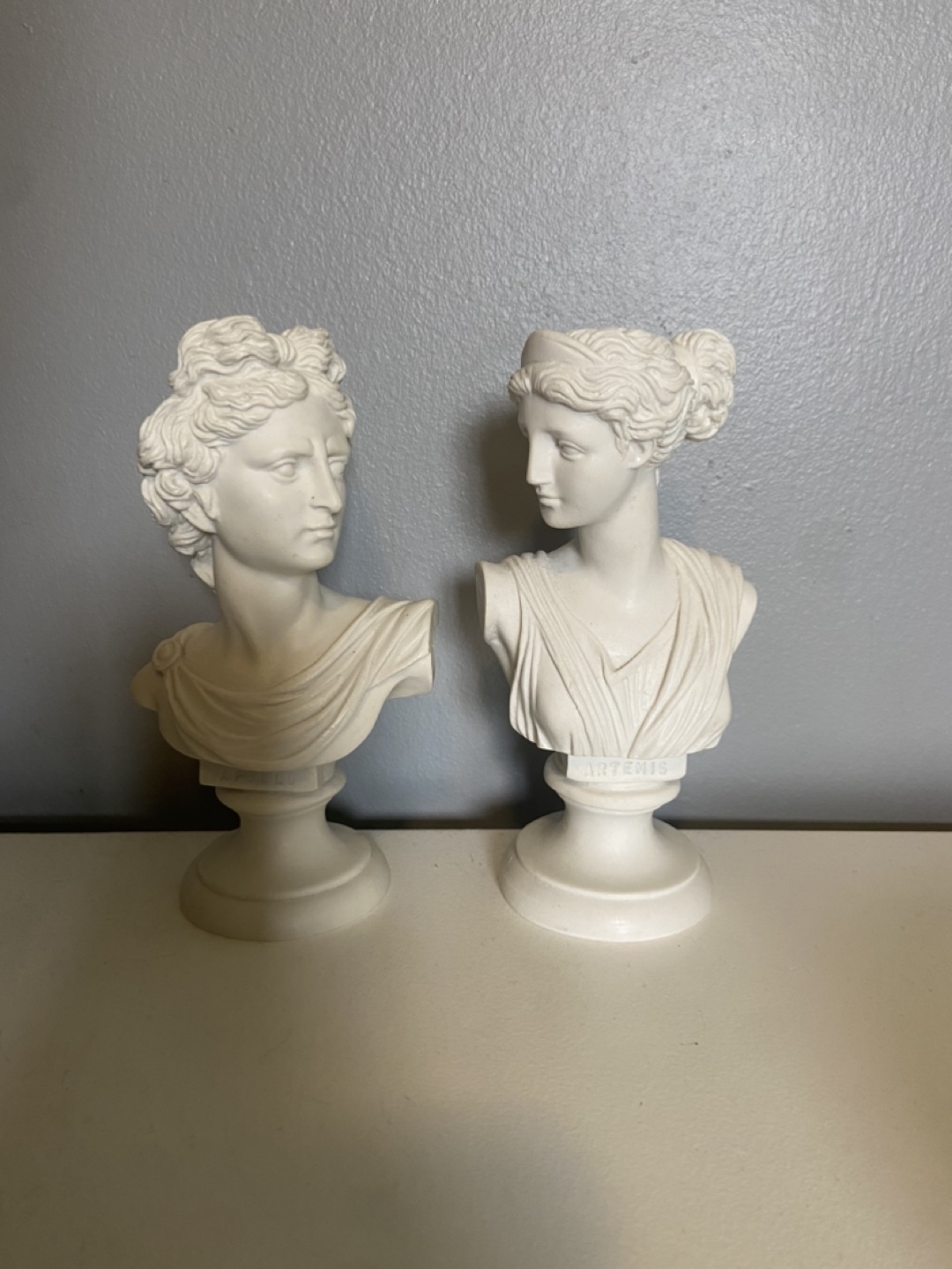2 greek statues