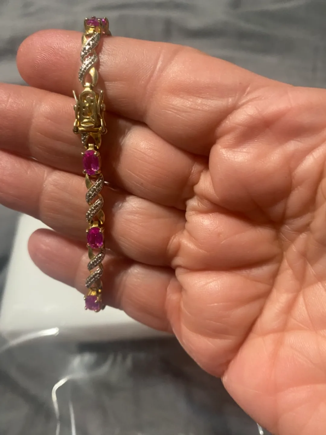 Gold Bracelet with Pink Gemstones image indicator(2)