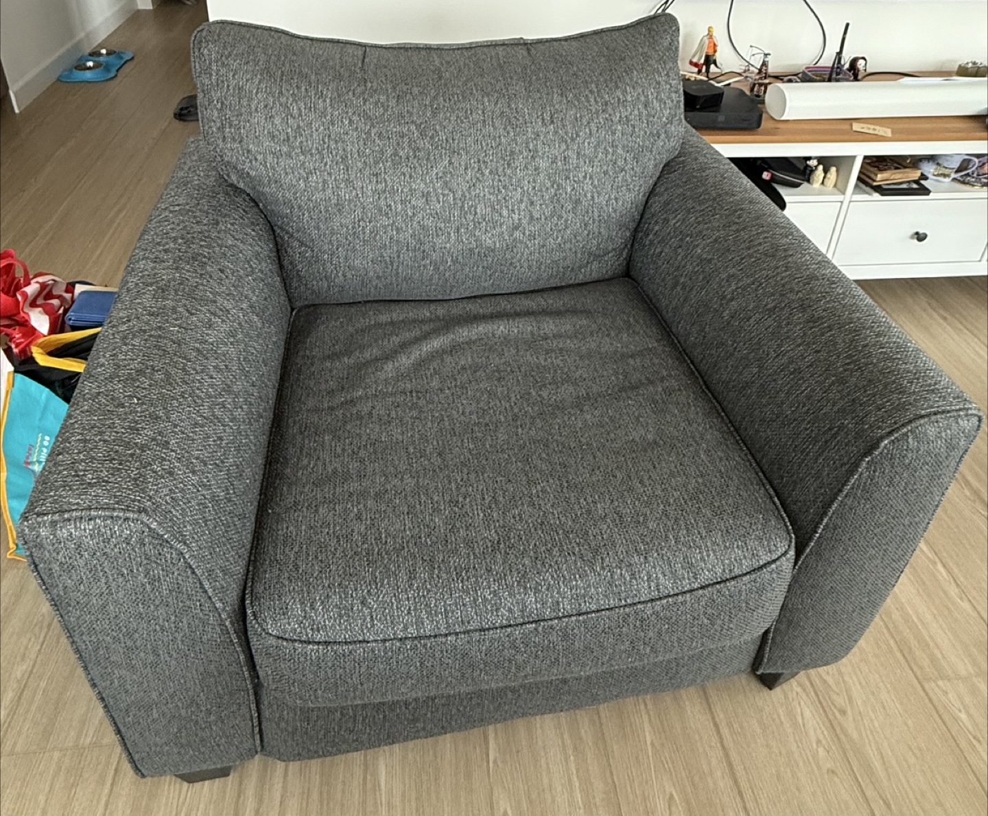 Gray arm chair and Ottoman