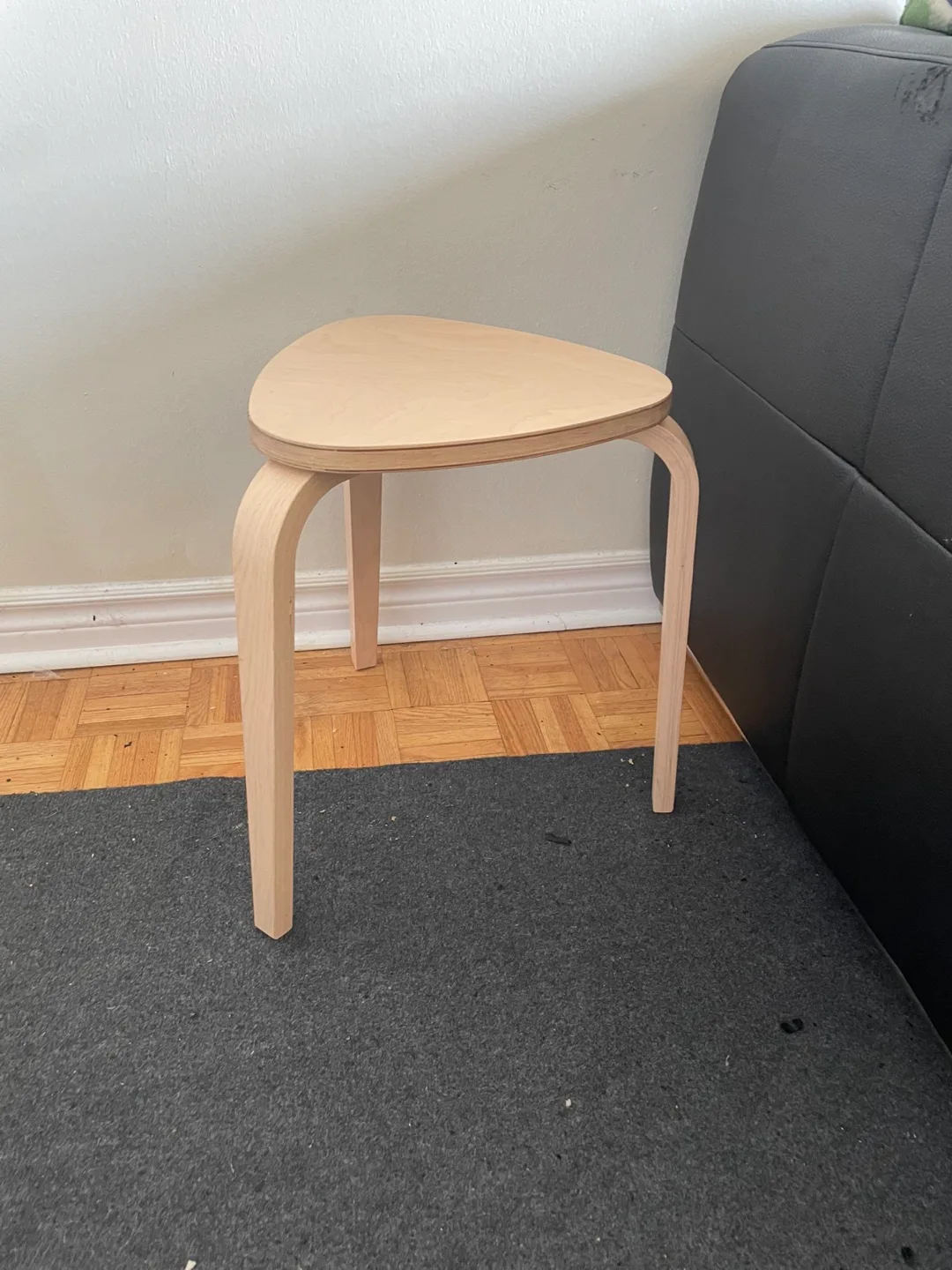 Light Wood Triangular Stool thumbnail