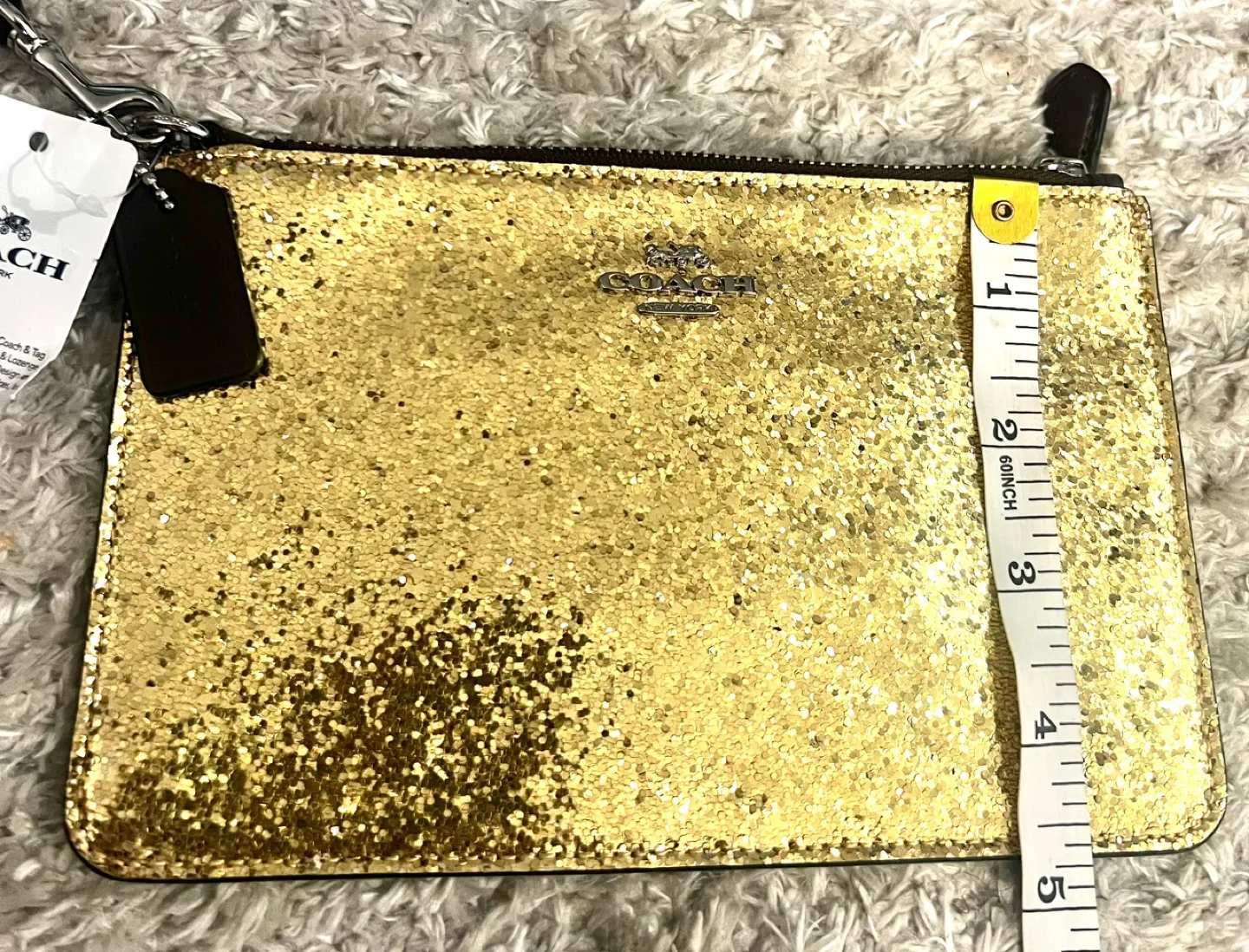 New With Tags Coach Gold Leather Glitter Wristlet image indicator(3)