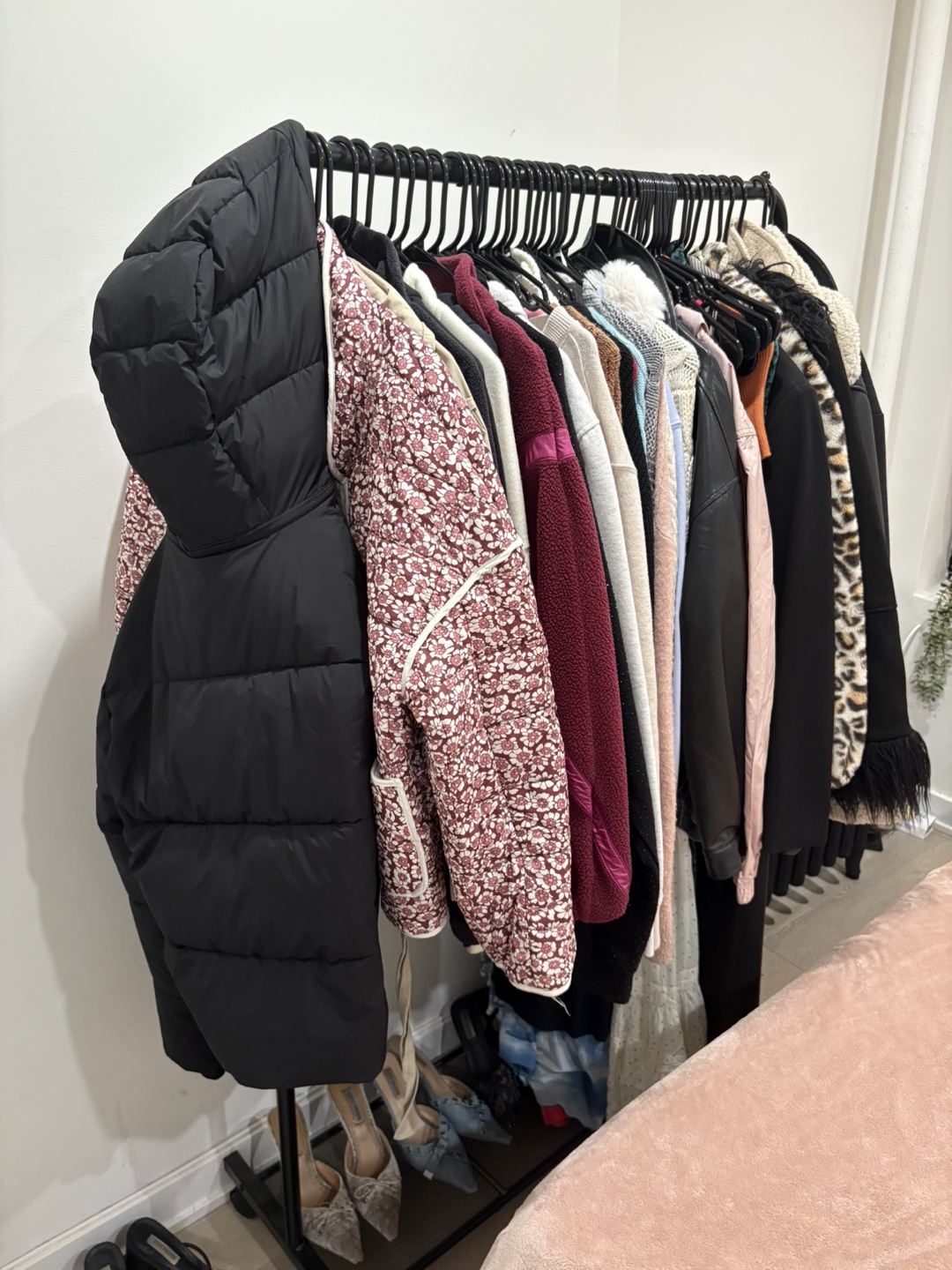Clothing rack with shelf at bottom
