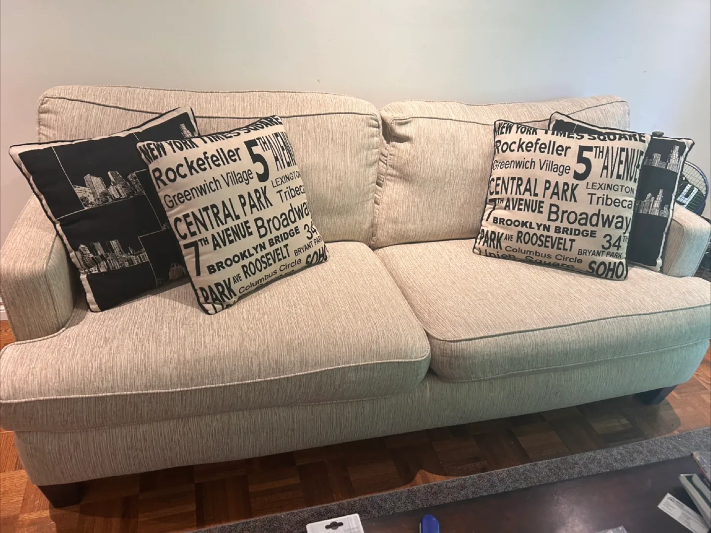 Beige Sofa with Throw Pillows thumbnail