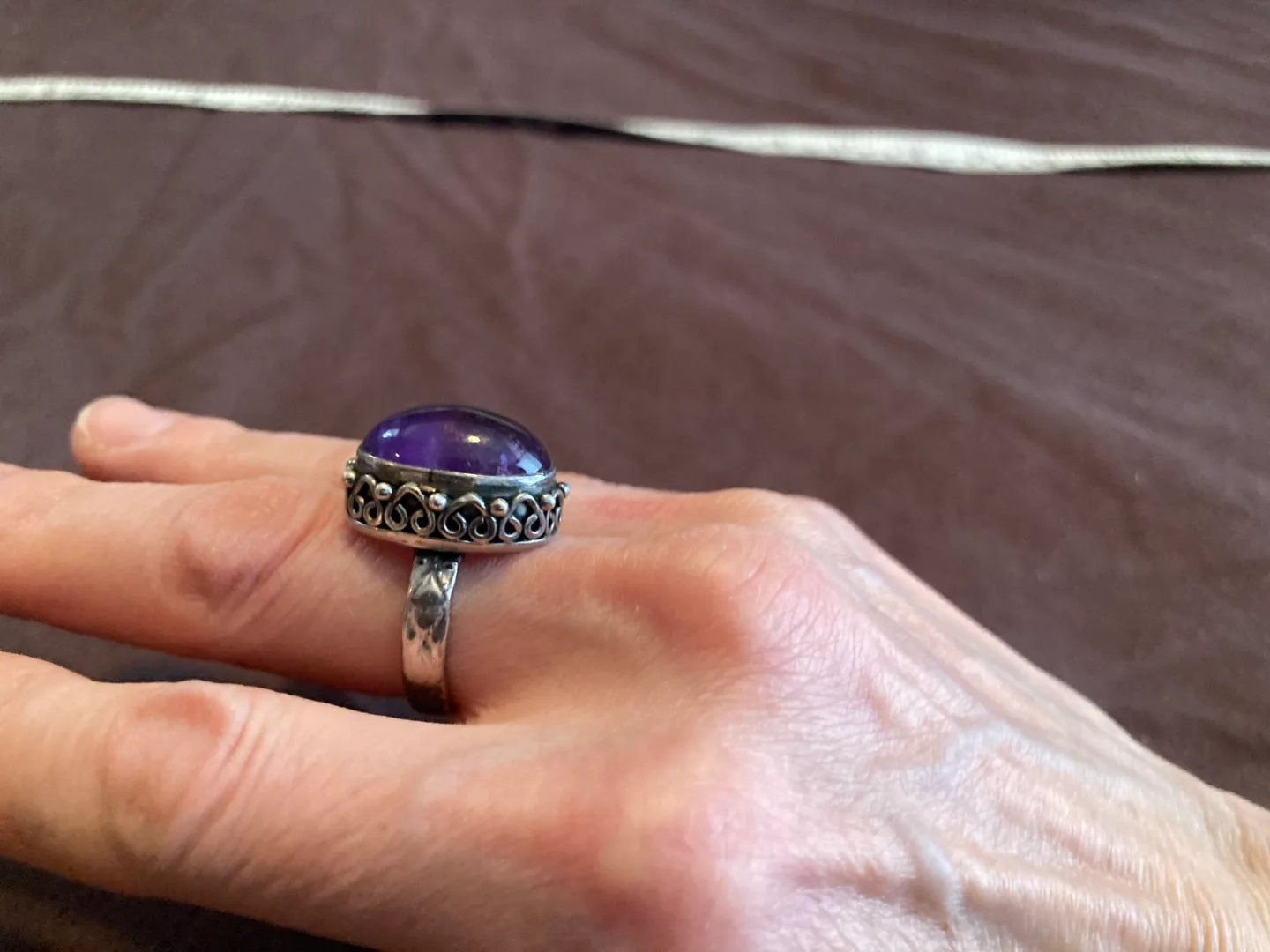 polished amethyst and sterling silver ring image indicator(2)