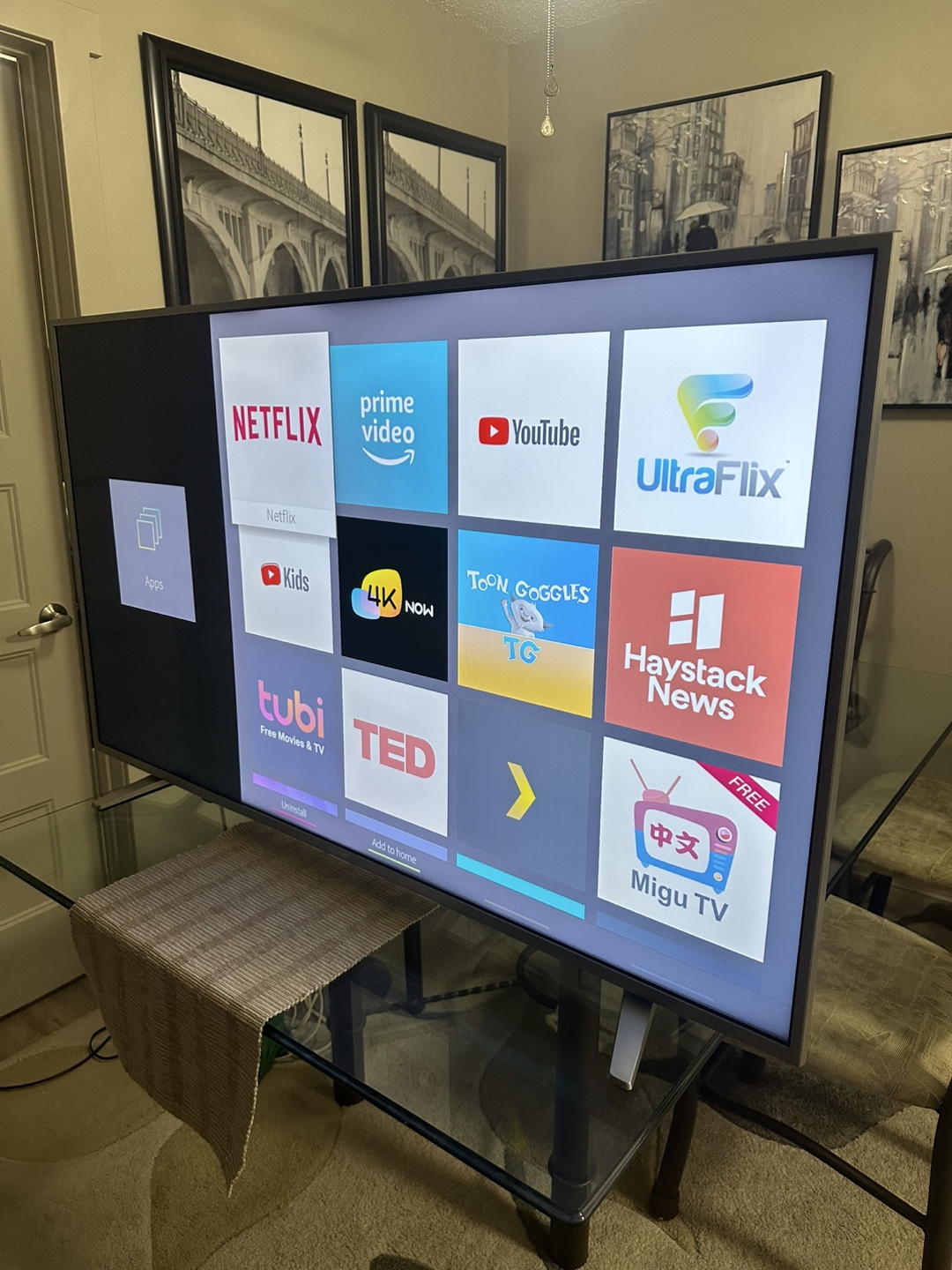 55-inch 4K UHD Smart TV is in pristine, like-new condition.