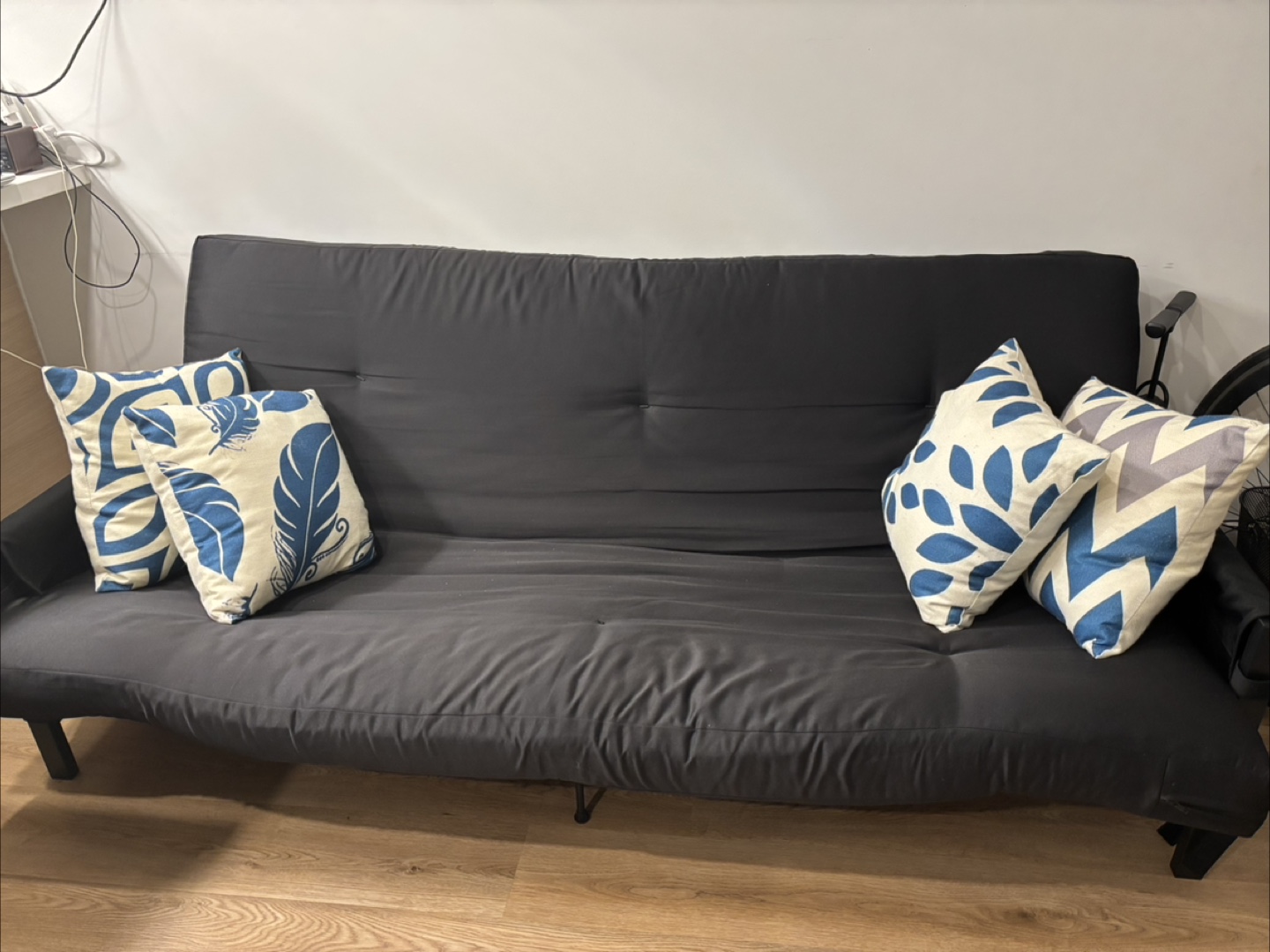 Black metal arm sofa bad