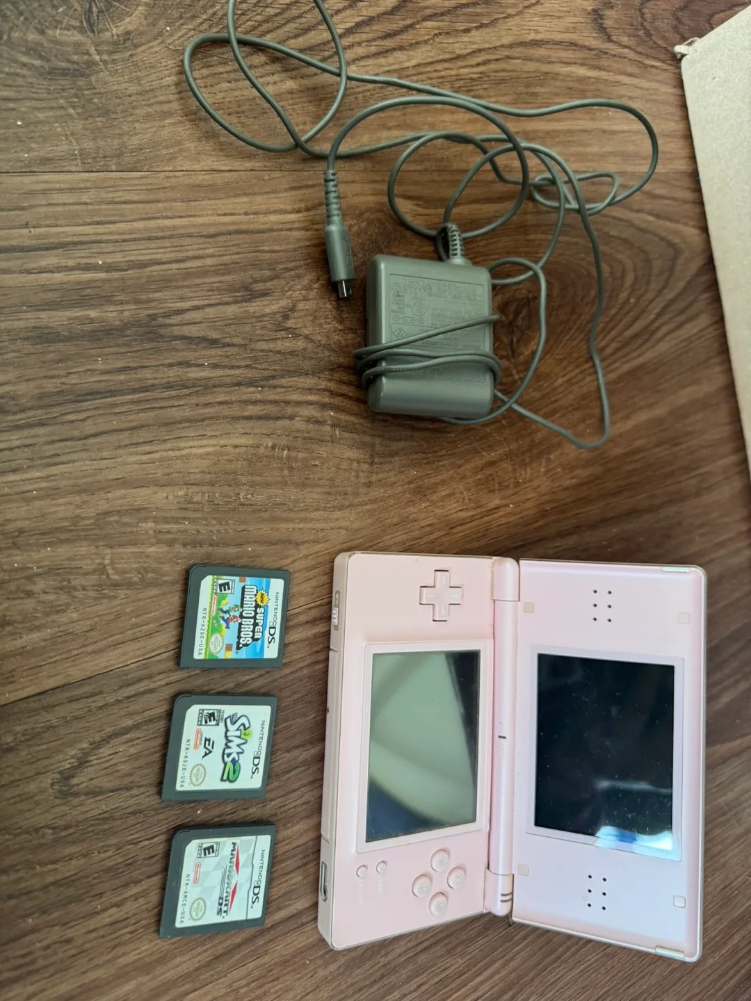 Nintendo DS Lite Pink with Games thumbnail
