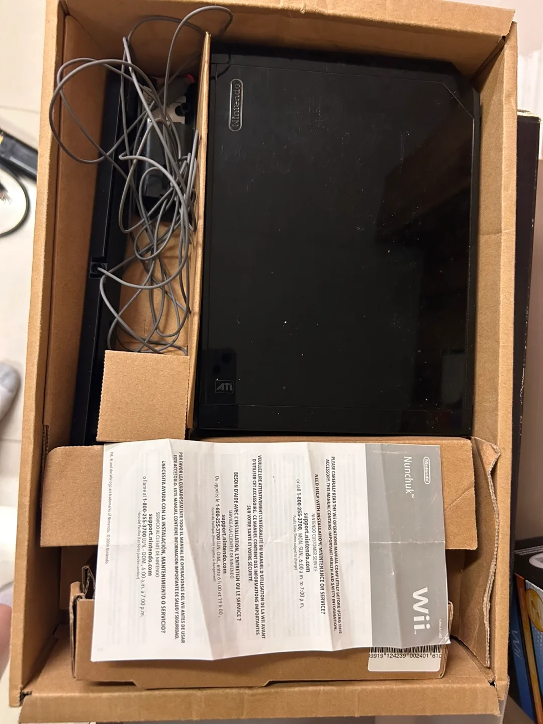 Black Nintendo Wii Console with Remote and different games thumbnail