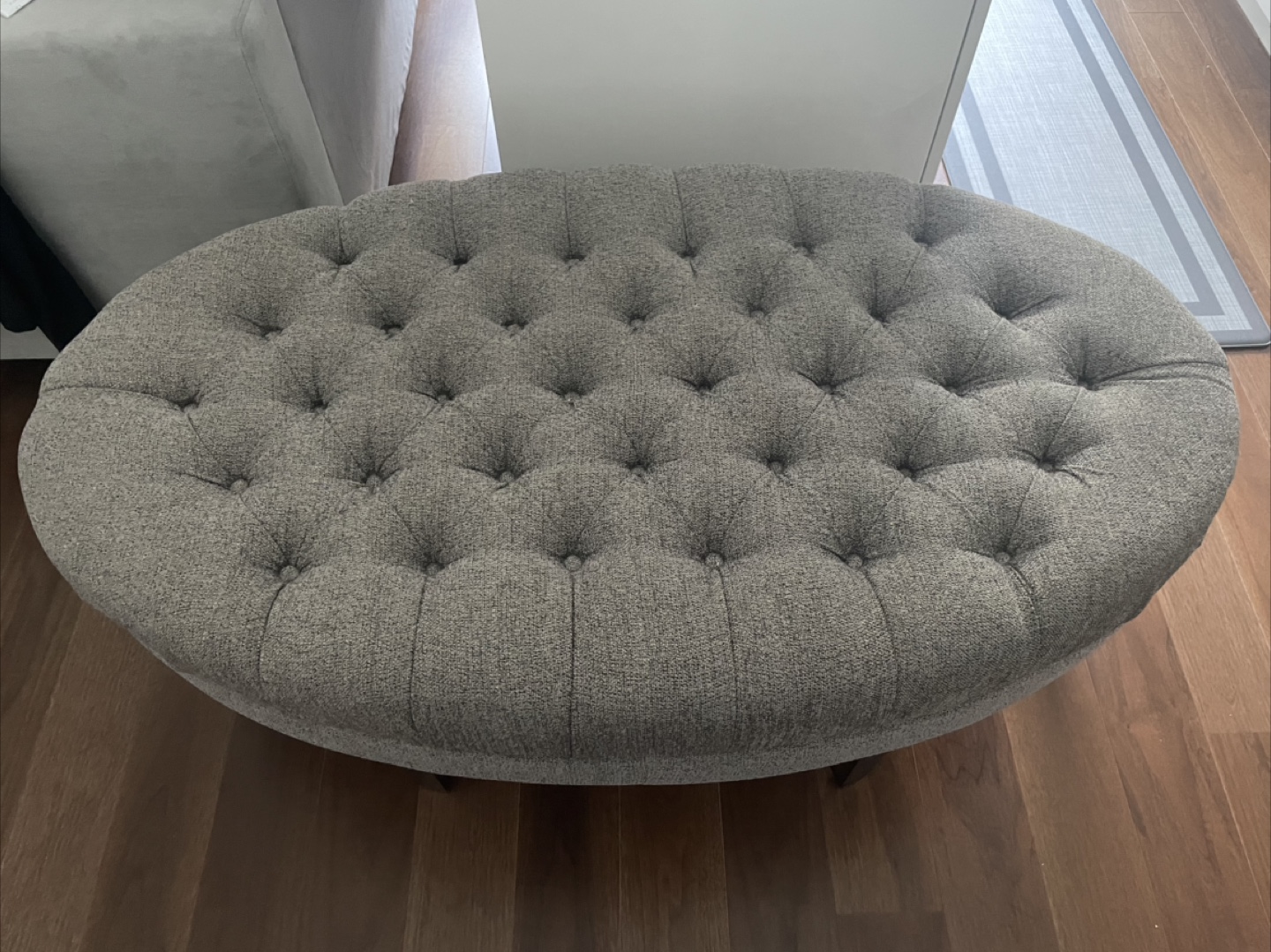 Gray Tufted Round Ottoman