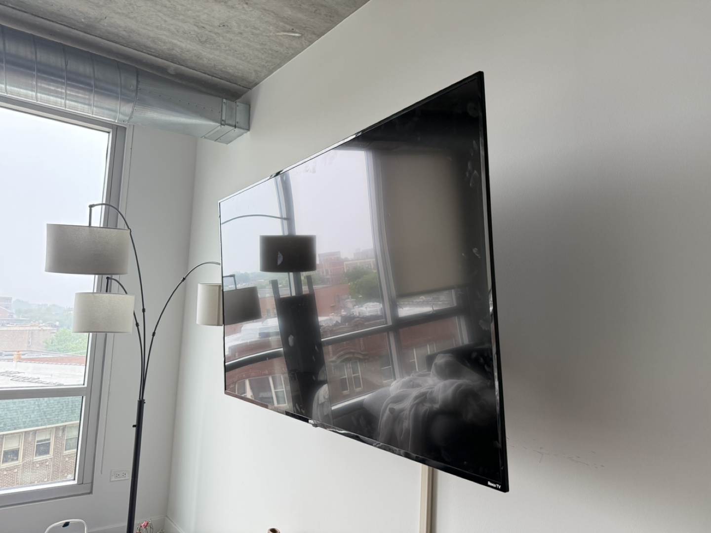 65-inch Roku Smart TV (Including FULL MOTION TV Mount)
