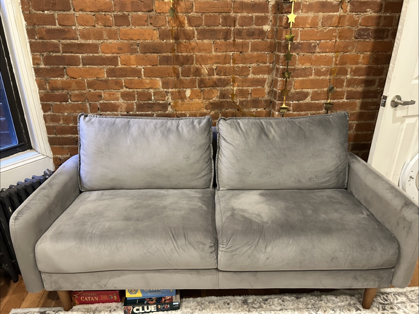 Gray couch and rug