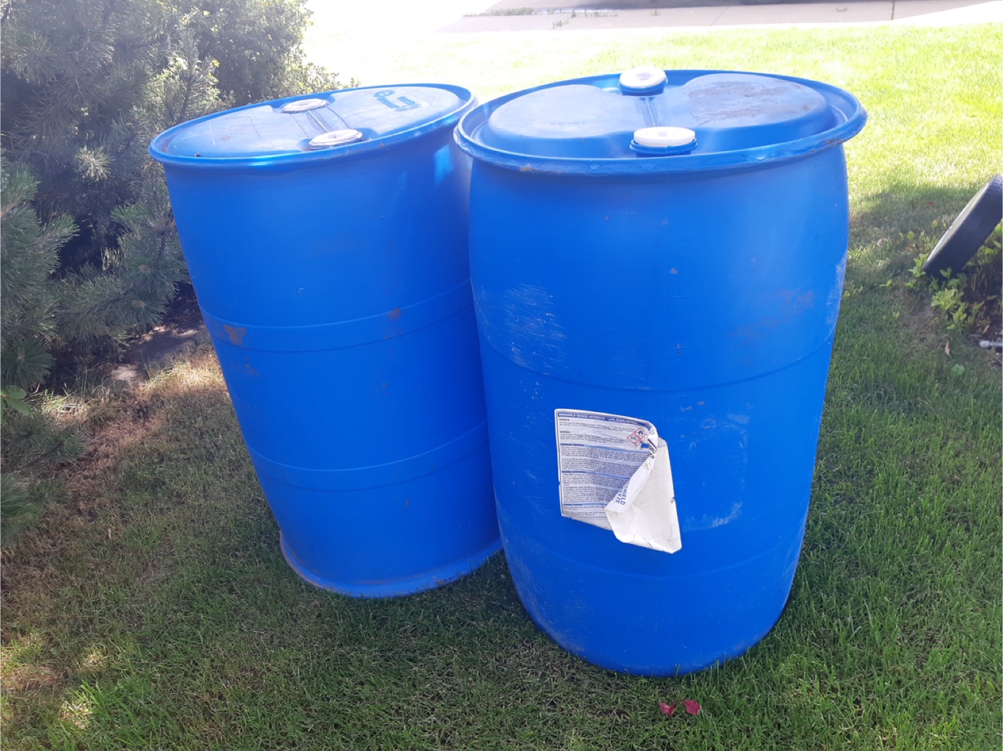 Blue Plastic Barrels for sale call 780 884 7800