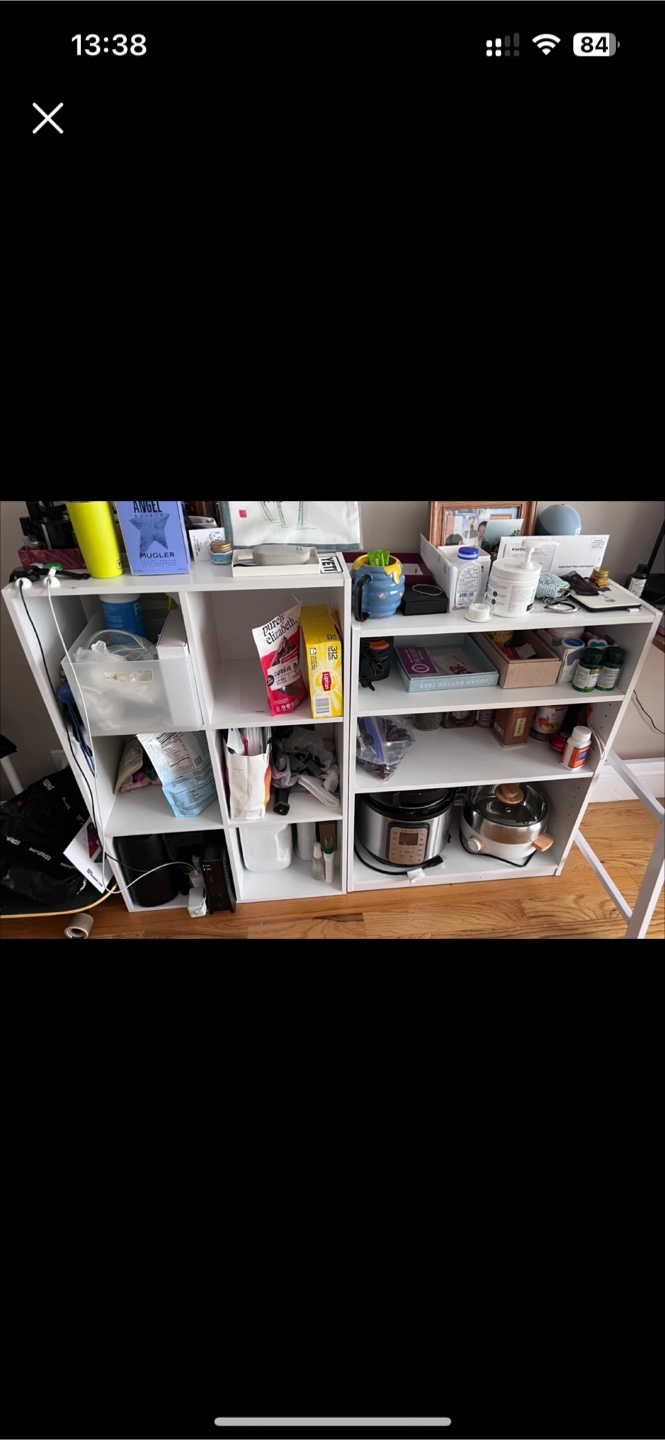 two white shelves 15 each