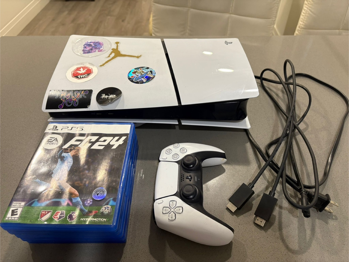 PlayStation 5 with Controller and FIFA 24
