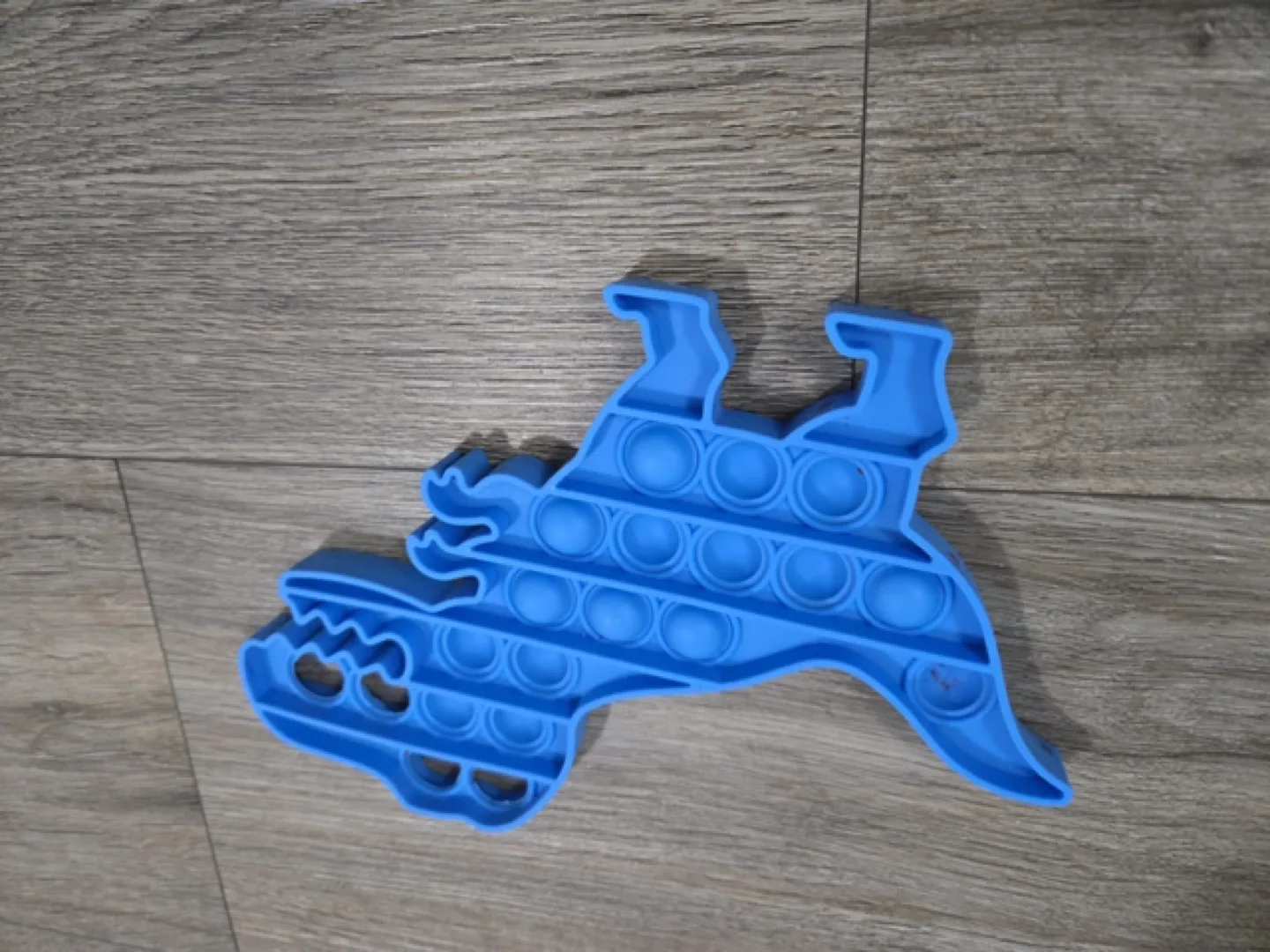 Blue Dinosaur Pop It Toy. #freecycle thumbnail