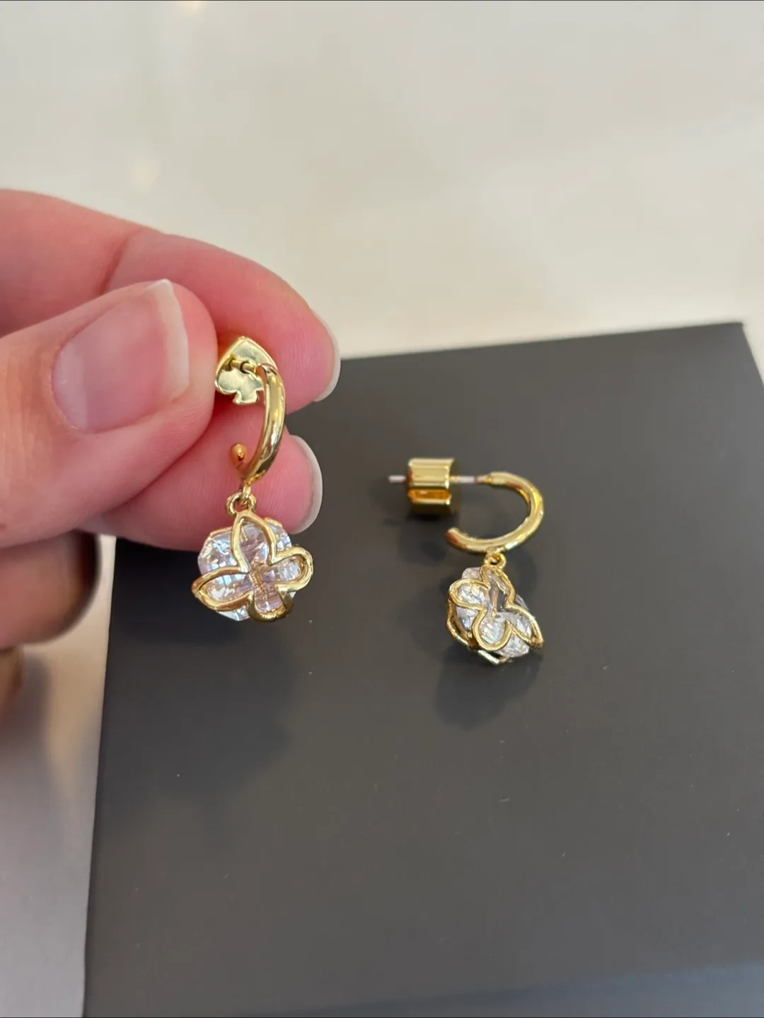 Kate Spade butterfly huggie earrings image indicator(2)