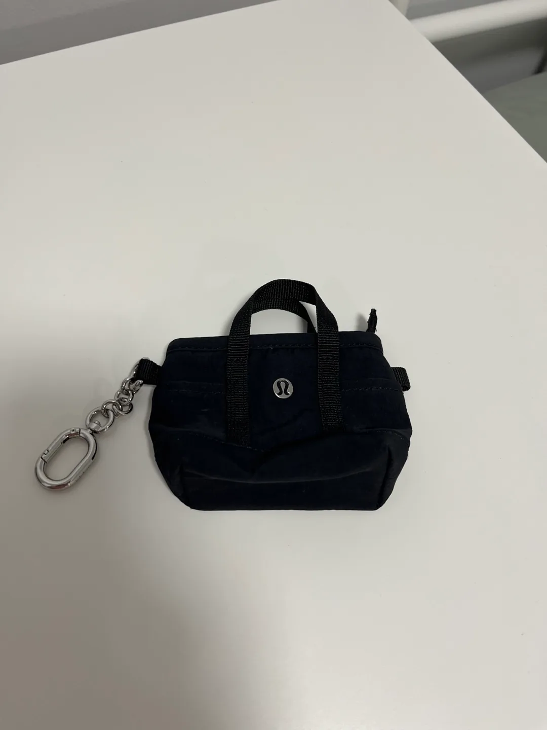 Lululemon Black Mini Belt Bag Keychain thumbnail